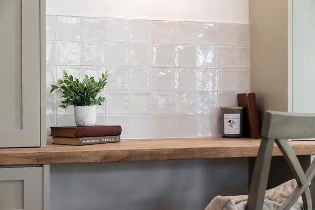 a vase of flowers sitting on a table