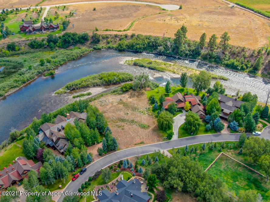 360 River's Bend Carbondale, CO 81623 - Photo 1 of 6 a view of a garden with a lake view