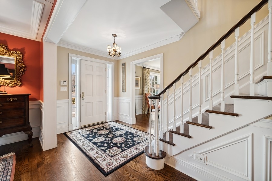 632 Chatham Road Glenview, IL 60025 - Photo 4 of 52 a view of entryway and hall with wooden floor