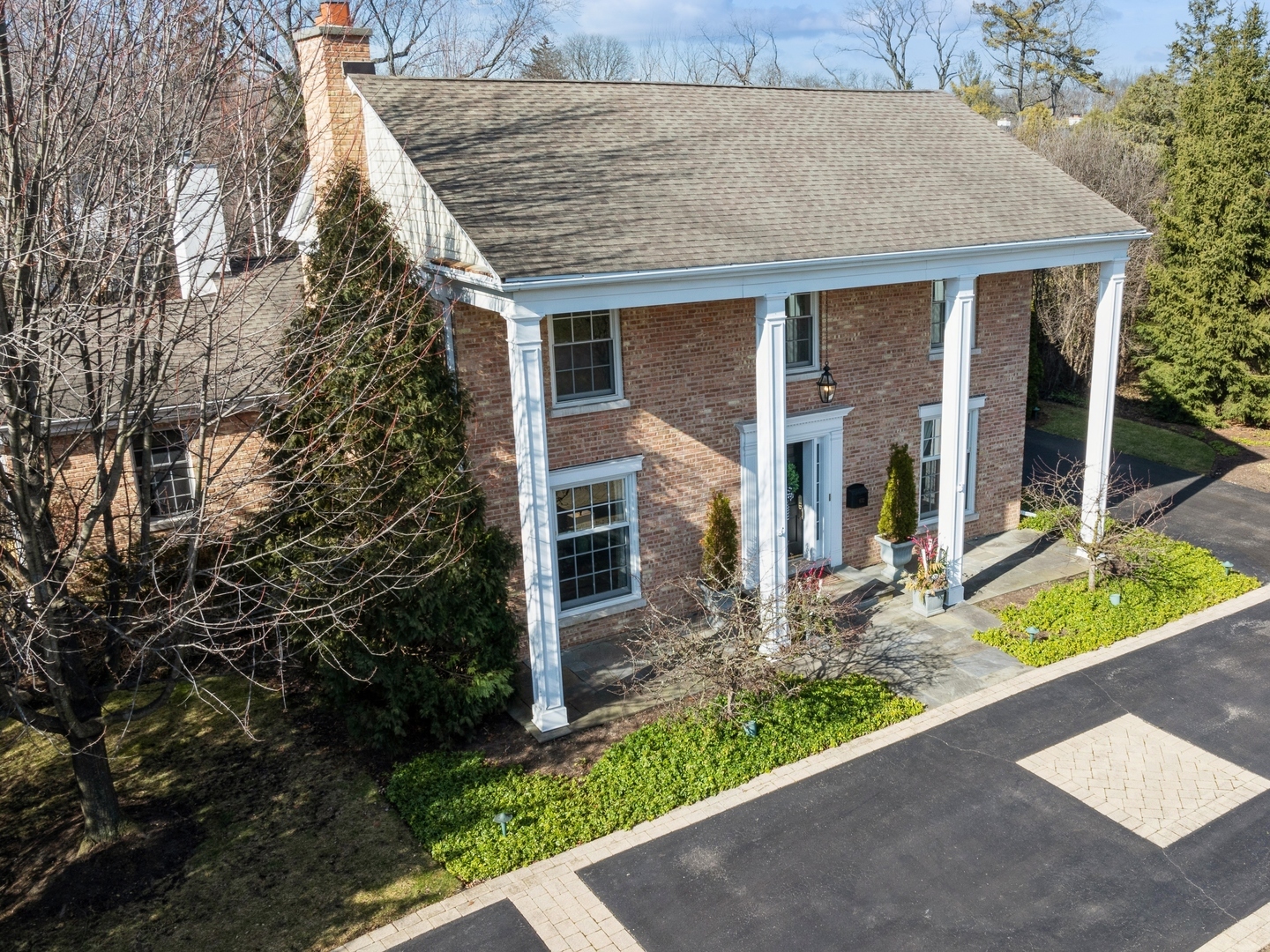 632 Chatham Road Glenview, IL 60025 - Photo 46 of 52 front view of house with a yard and potted plants