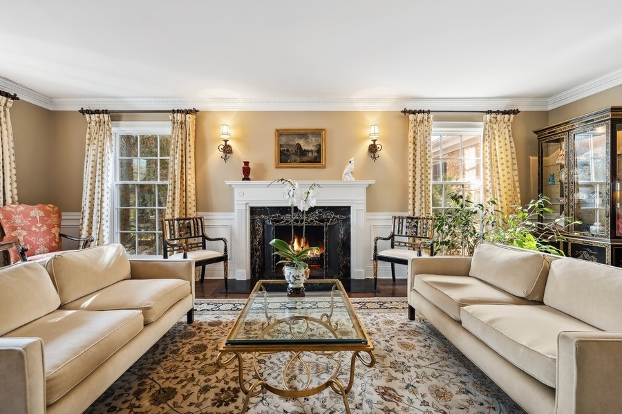 632 Chatham Road Glenview, IL 60025 - Photo 6 of 52 a living room with furniture and a fireplace