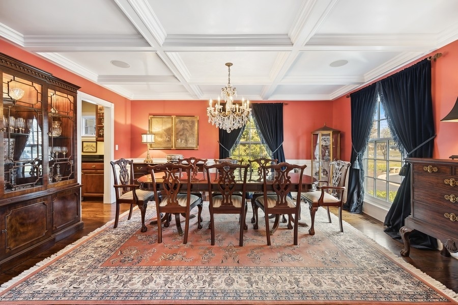 632 Chatham Road Glenview, IL 60025 - Photo 7 of 52 a view of a dining room with furniture window and wooden floor