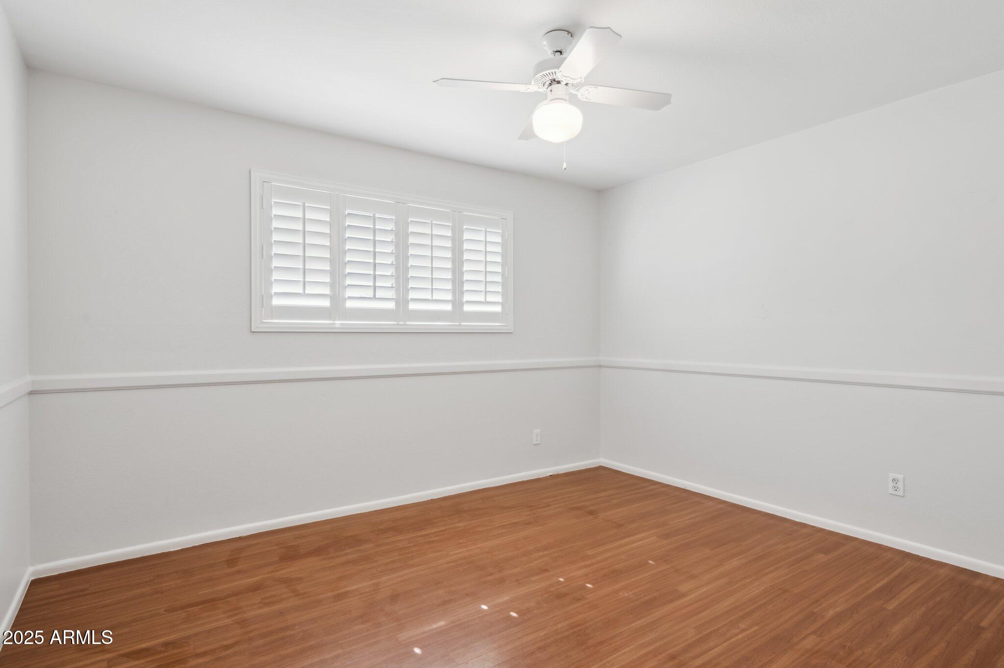 602 West Palmaire Avenue Phoenix, AZ 85021 - Photo 17 of 33 an empty room with a window