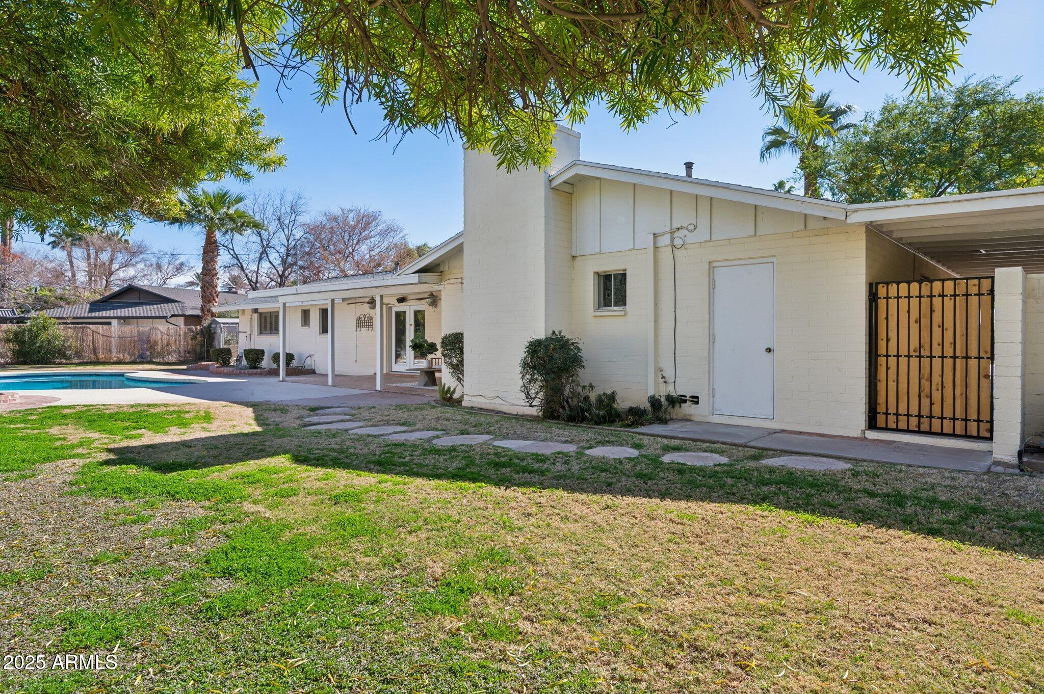 602 West Palmaire Avenue Phoenix, AZ 85021 - Photo 29 of 33 a view of a house with a yard