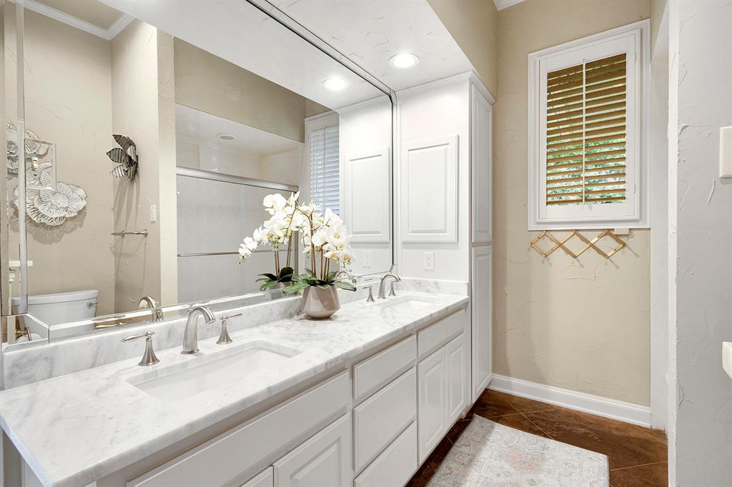 103 Glenn Road Mabank, TX 75156 - Photo 24 of 38 a bathroom with a granite countertop sink and a mirror