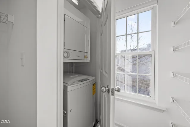 a bathroom with a sink double vanity granite and a mirror