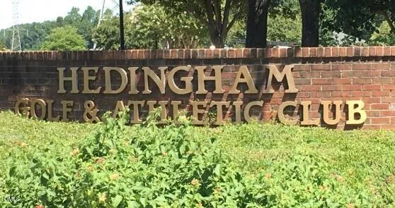 a front view of a house with outdoor seating
