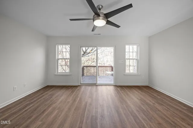 a view of kitchen with sink microwave and refrigerator