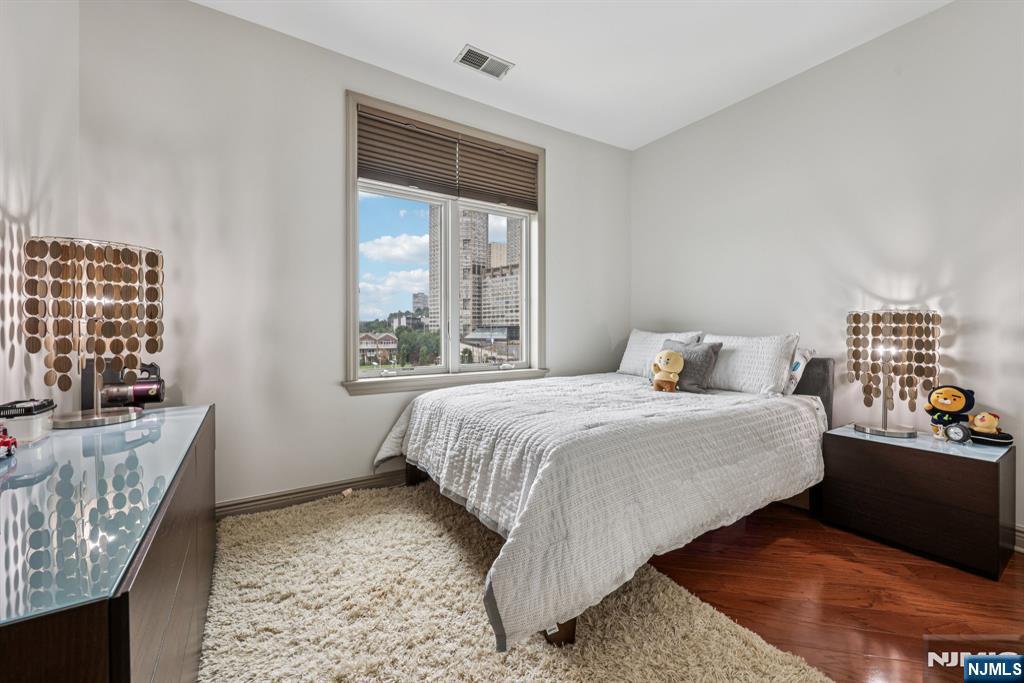 7400 River Road, Unit 409 North Bergen, NJ 07047 - Photo 14 of 30 a bedroom with a bed and window