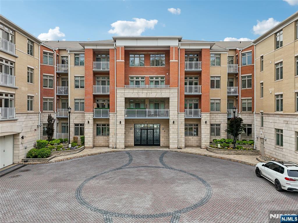 7400 River Road, Unit 409 North Bergen, NJ 07047 - Photo 28 of 30 a view of building with a street