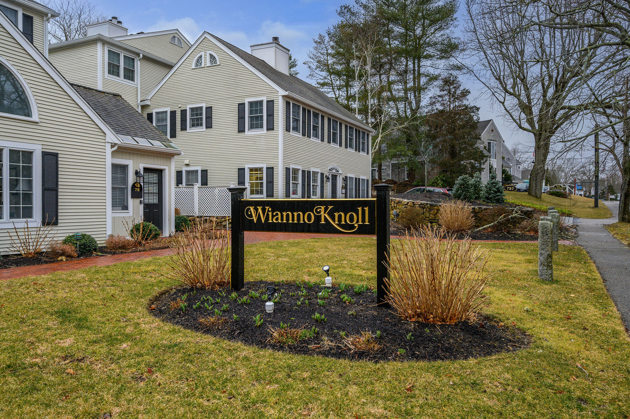 727 Main Street, Unit C3 Osterville, MA 02655 - Photo 2 of 23 a view of a house with a yard