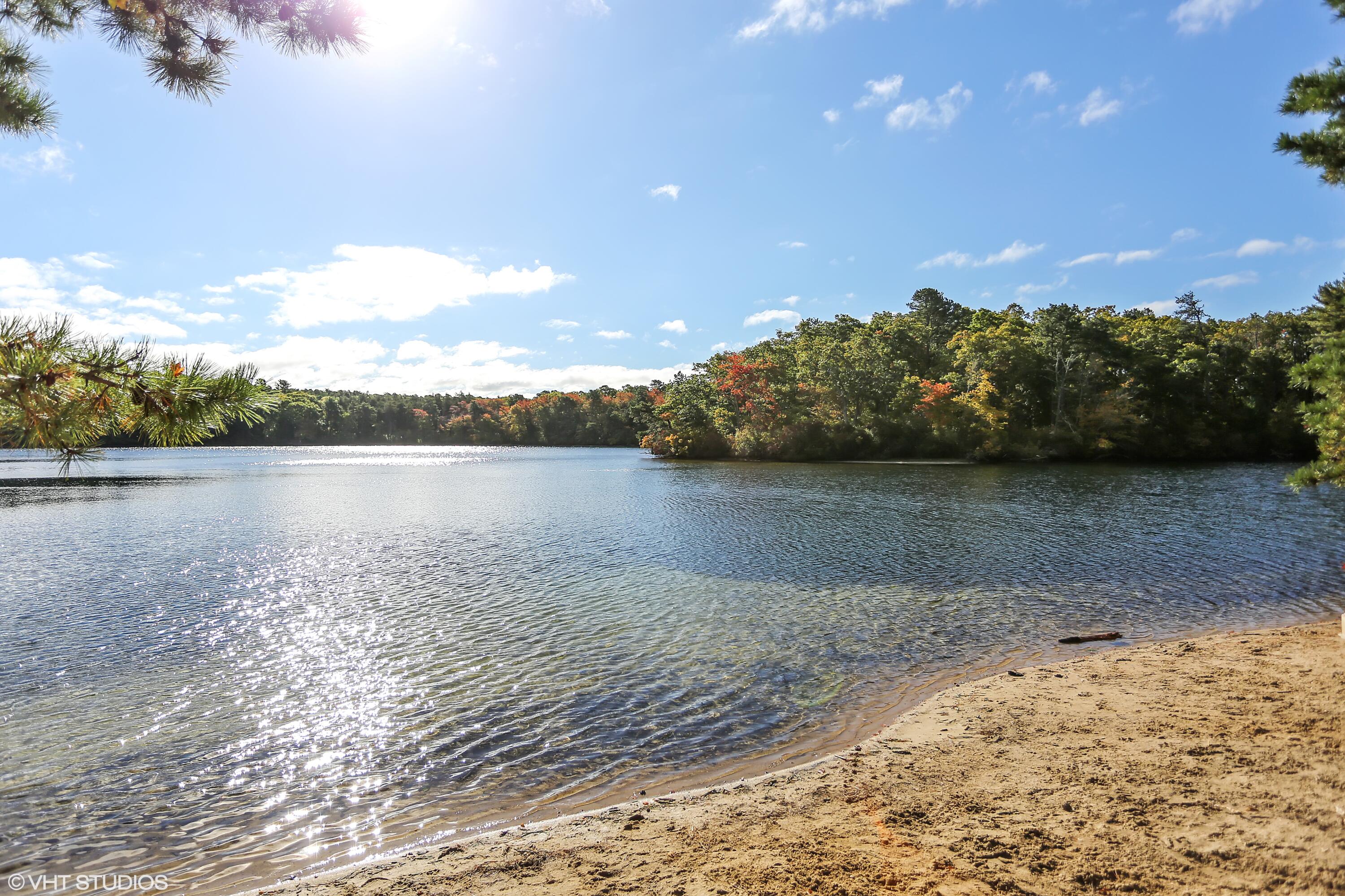 727 Main Street, Unit C3 Osterville, MA 02655 - Photo 22 of 23 a view of a lake from a yard