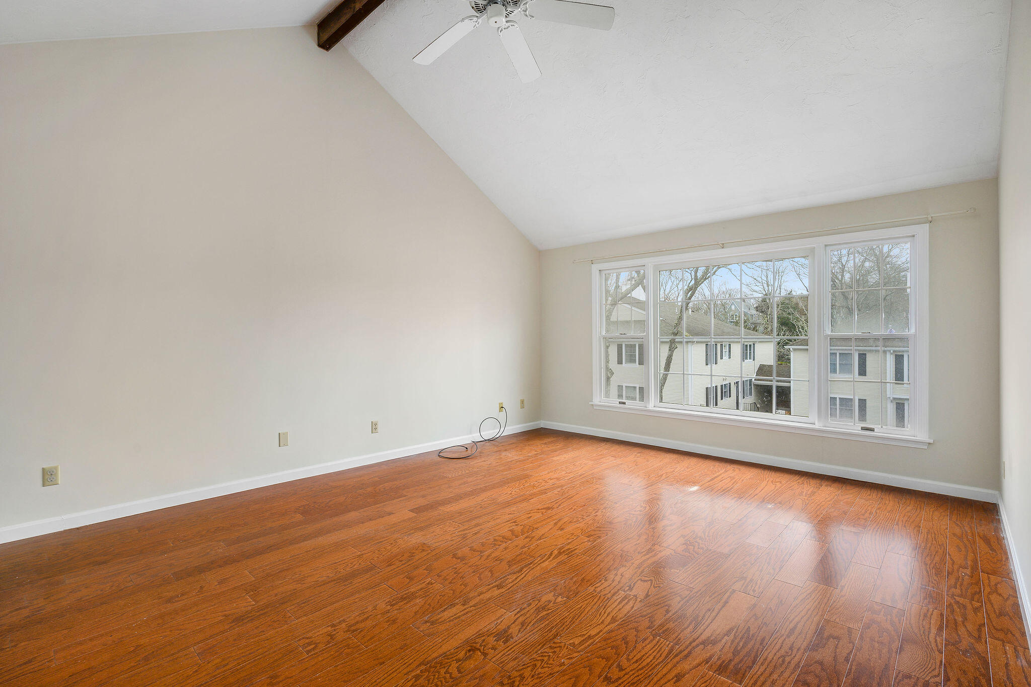 727 Main Street, Unit C3 Osterville, MA 02655 - Photo 5 of 23 wooden floor in an empty room with a window