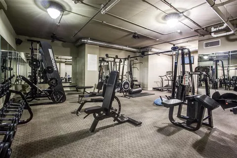 a view of a room with gym equipment