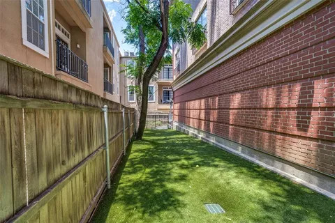 a view of a backyard with a garden