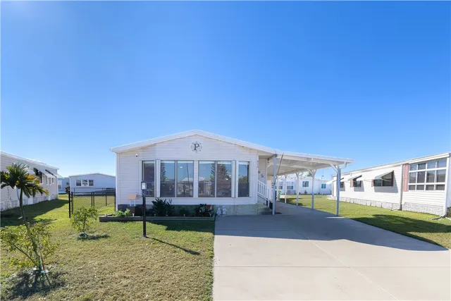 $174,000 | 913 Redbud Road, Barefoot Bay, FL 32976