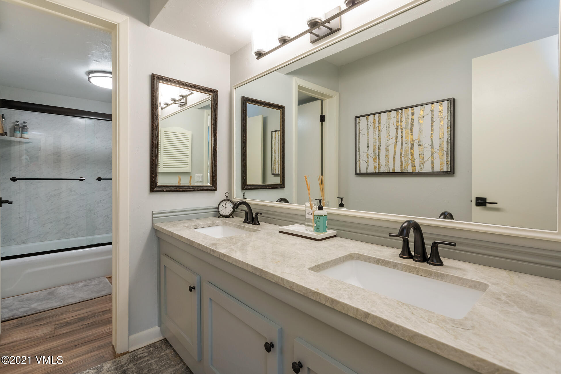980 Vail View Drive, Unit 211B Vail, CO 81657 - Photo 15 of 21 a bathroom with a sink and a mirror
