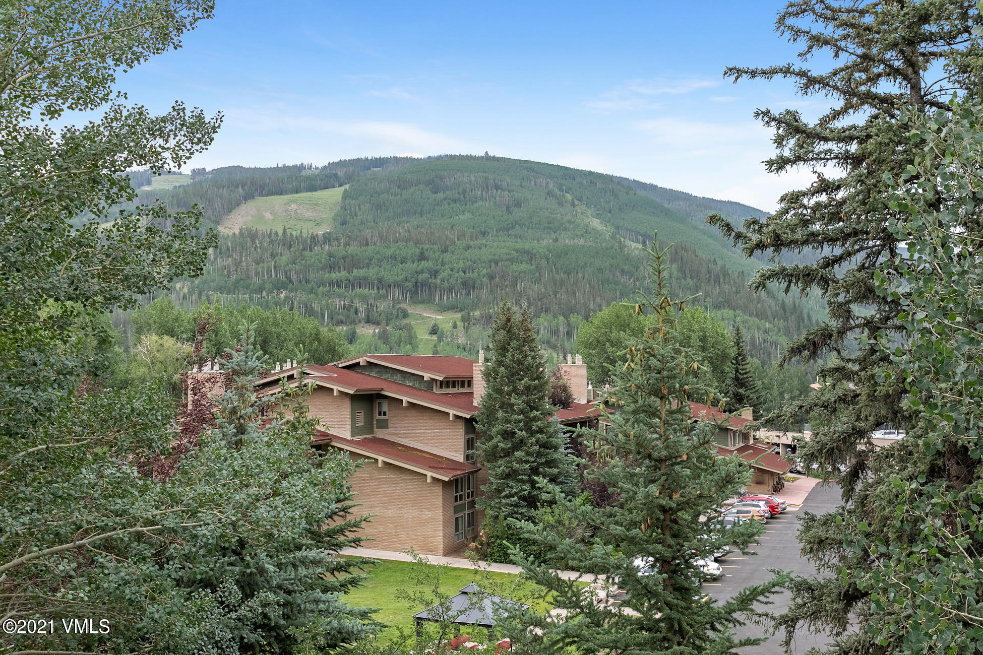 980 Vail View Drive, Unit 211B Vail, CO 81657 - Photo 20 of 21 an aerial view of a house with a yard