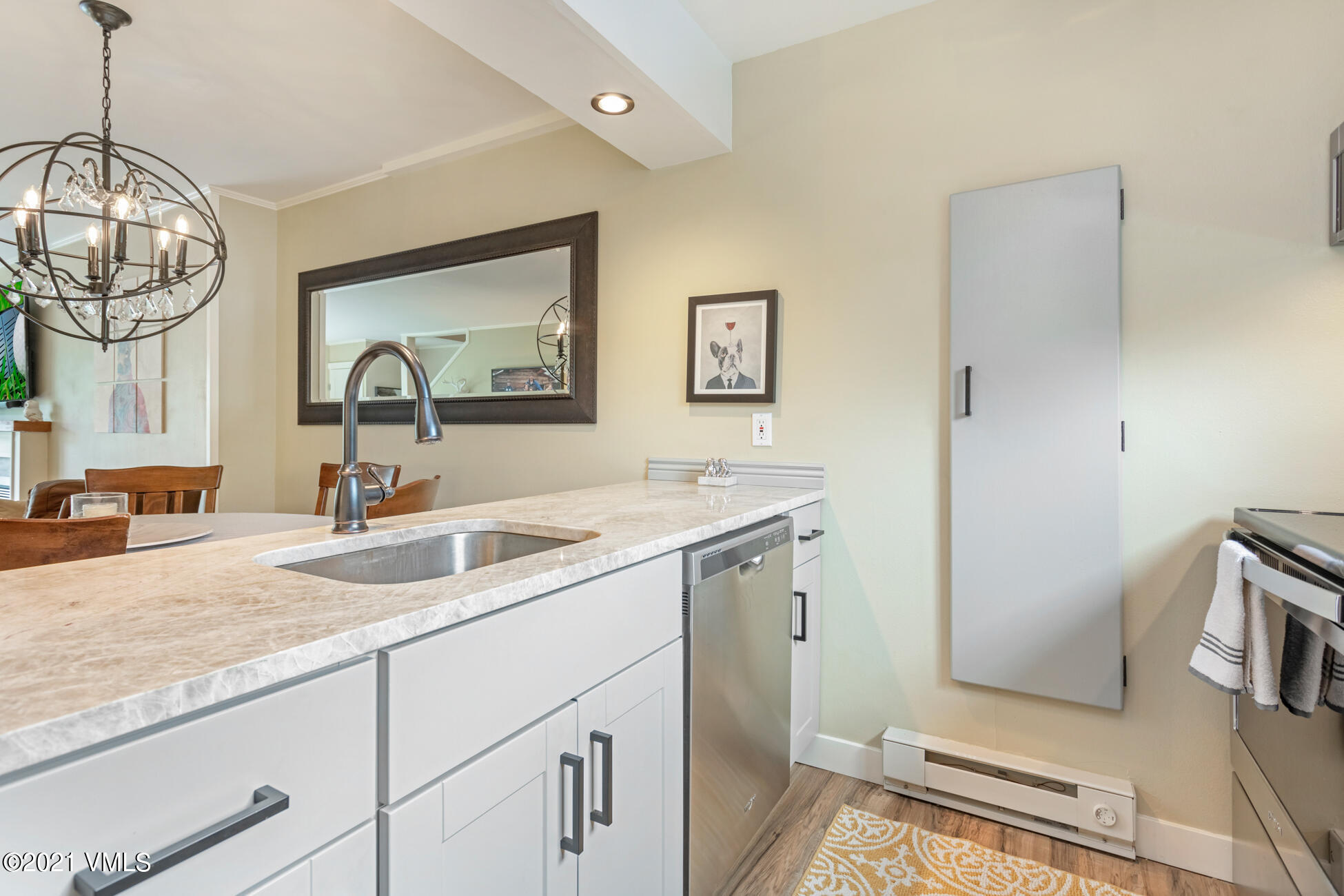980 Vail View Drive, Unit 211B Vail, CO 81657 - Photo 6 of 21 a view of a bathroom with dual sinks