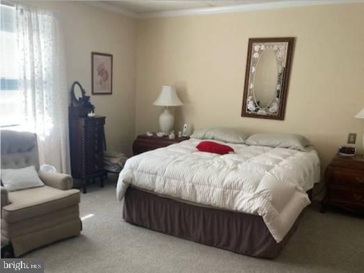 710 Fox Court Langhorne, PA 19047 - Photo 15 of 22 a bedroom with a bed and a couch