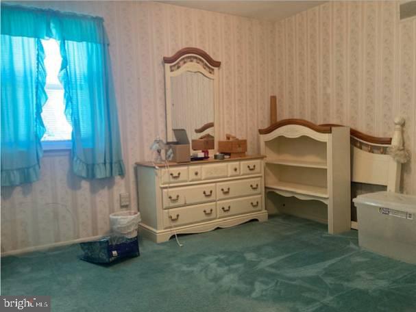 710 Fox Court Langhorne, PA 19047 - Photo 16 of 22 a room with a closet and mirror