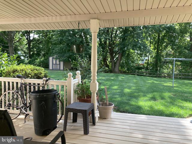 710 Fox Court Langhorne, PA 19047 - Photo 6 of 22 a view of a chair and table in backyard of the house