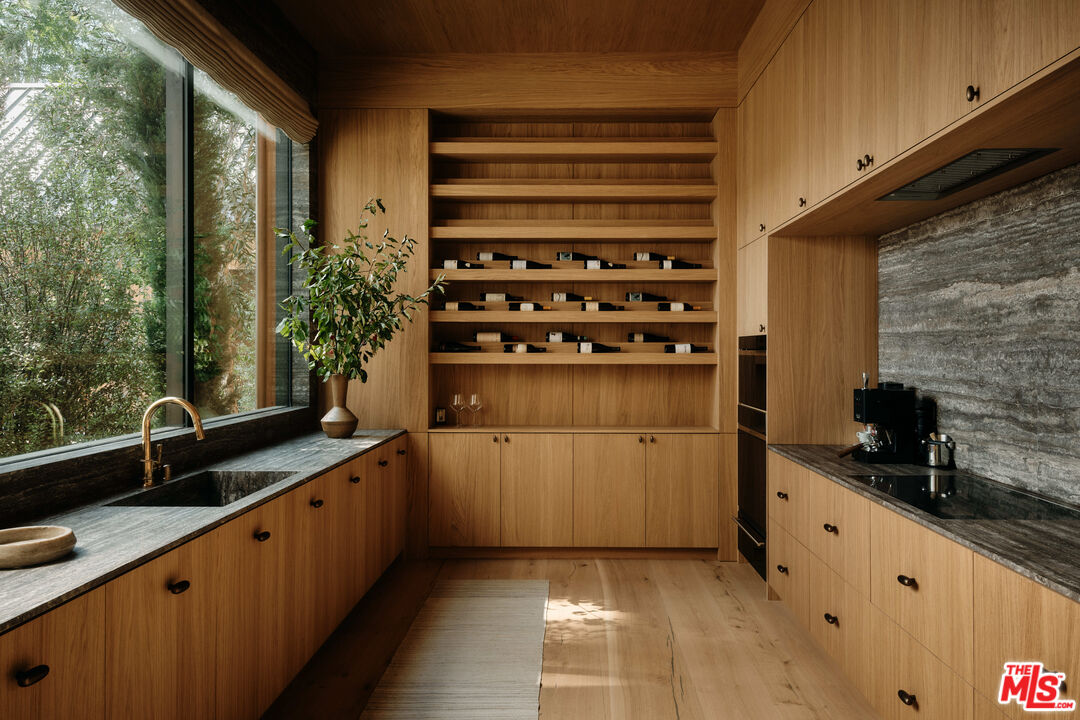 3405 Fryman Road Studio City, CA 91604 - Photo 11 of 31 a kitchen with a sink and cabinets