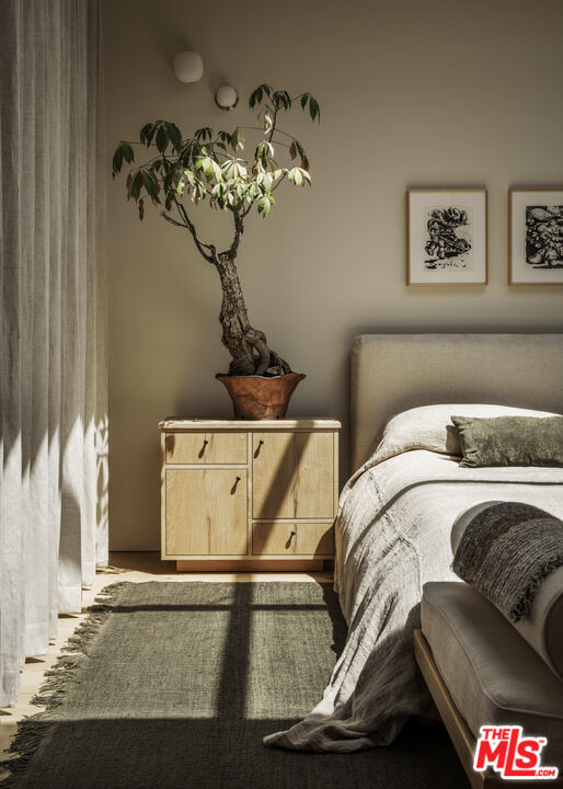 3405 Fryman Road Studio City, CA 91604 - Photo 21 of 31 a bedroom with a bed and a couch