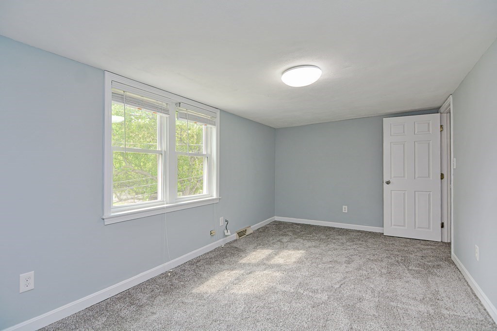 20 Alder Road Norton, MA 02766 - Photo 16 of 32 a view of an empty room with a window