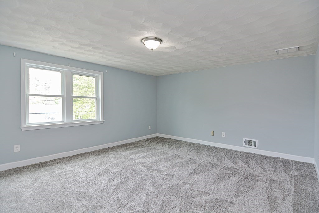 20 Alder Road Norton, MA 02766 - Photo 18 of 32 an empty room with a window