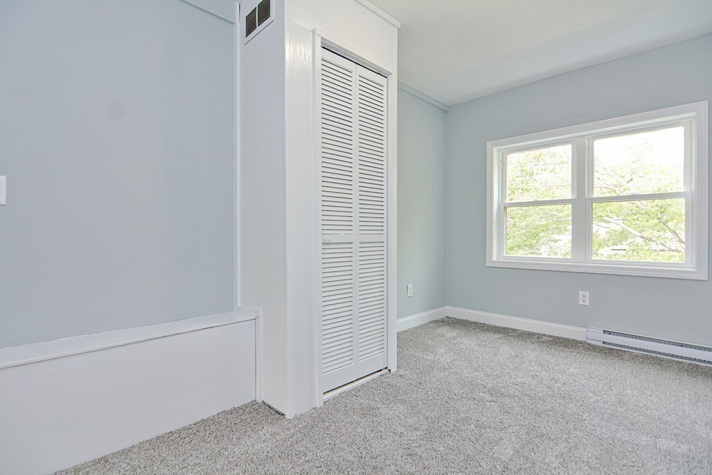 20 Alder Road Norton, MA 02766 - Photo 19 of 32 an empty room with windows