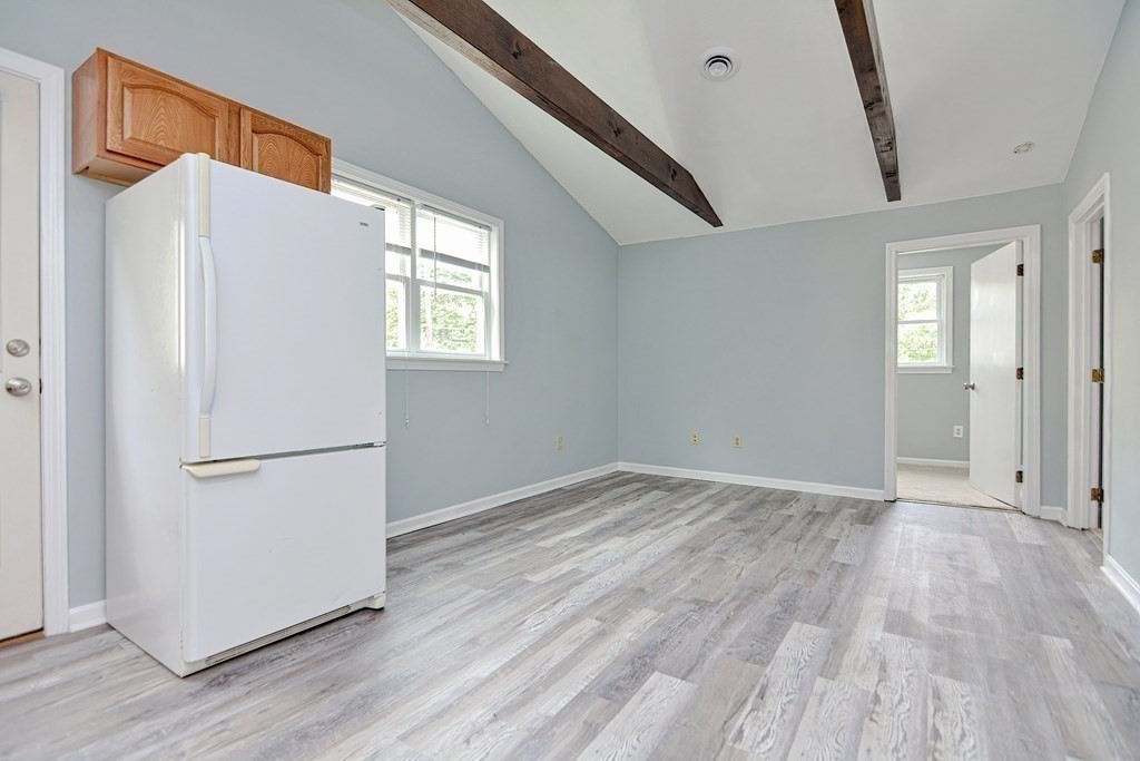 20 Alder Road Norton, MA 02766 - Photo 21 of 32 a view of empty room with wooden floor and window