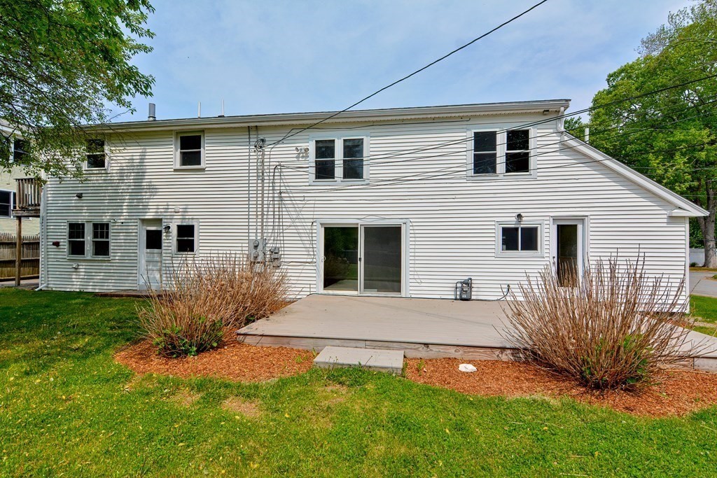 20 Alder Road Norton, MA 02766 - Photo 3 of 32 a front view of a house with garden