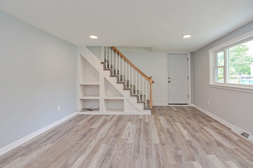 20 Alder Road Norton, MA 02766 - Photo 7 of 32 a view of room with wooden floor and window