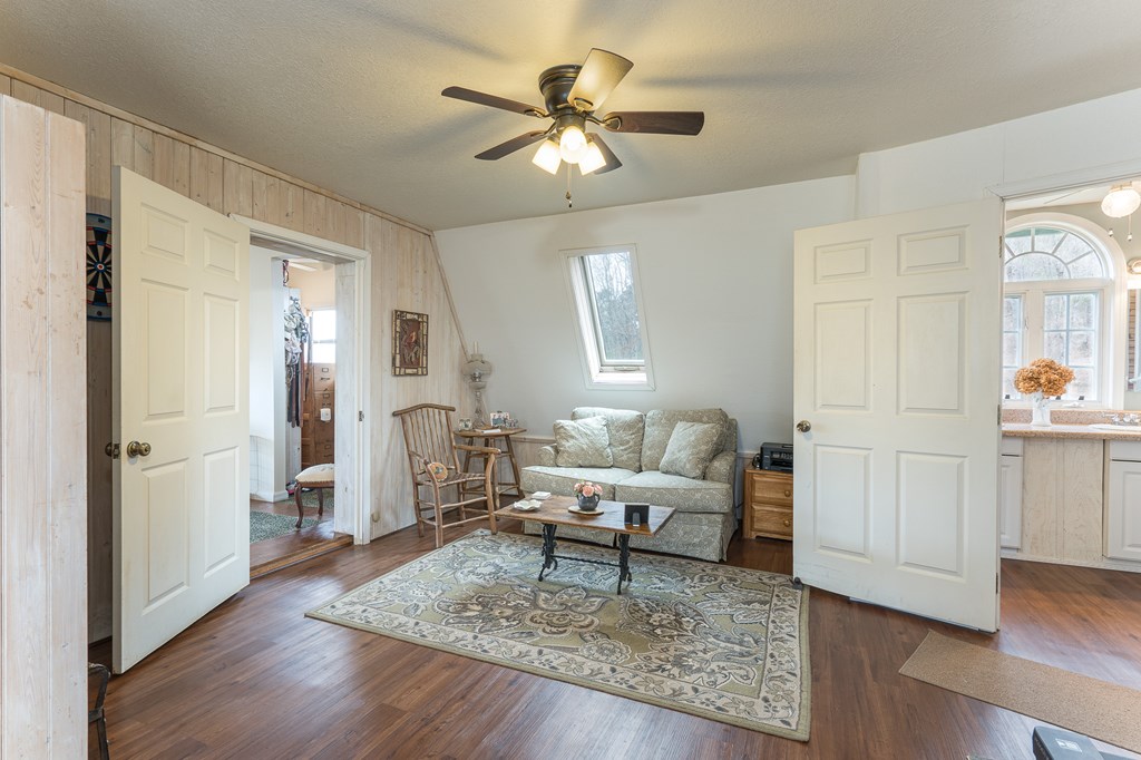 457 Persimmon Hts Road Murphy, NC 28906 - Photo 28 of 42 a living room with furniture and wooden floor