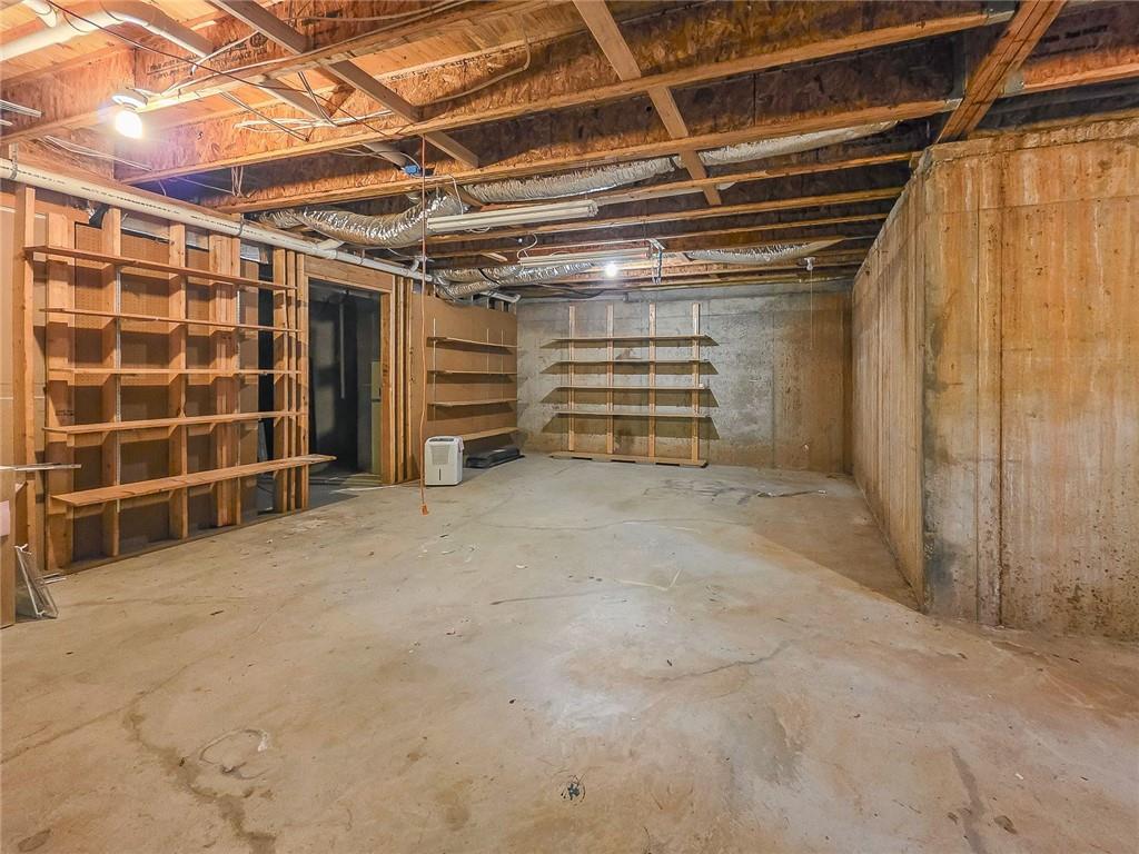 3712 Frederica Road Northwest Berkeley Lake, GA 30096 - Photo 38 of 49 a view of an empty room with a staircase