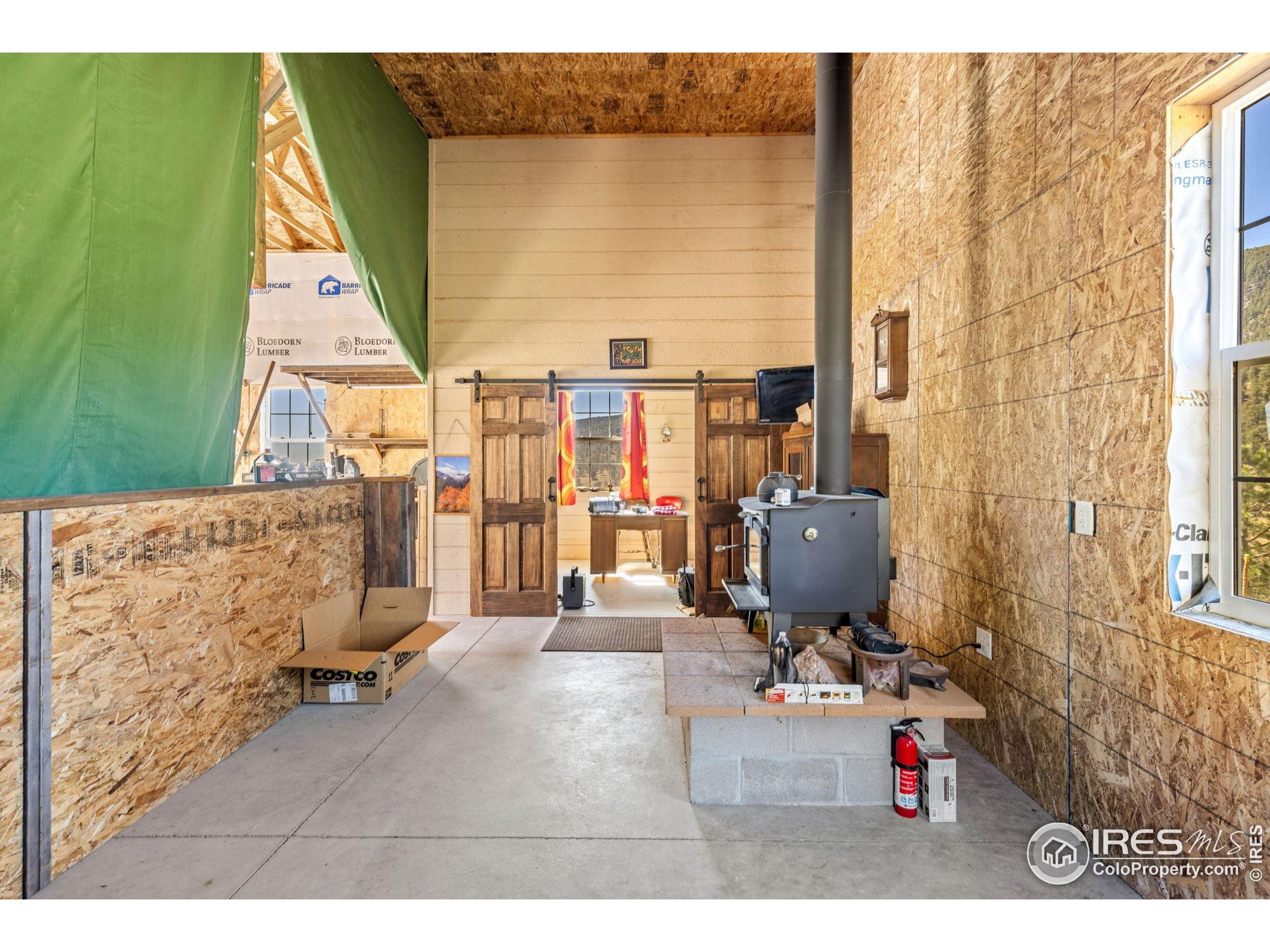 681 Bitterroot Gulch Road Loveland, CO 80537 - Photo 39 of 47 a living room with furniture