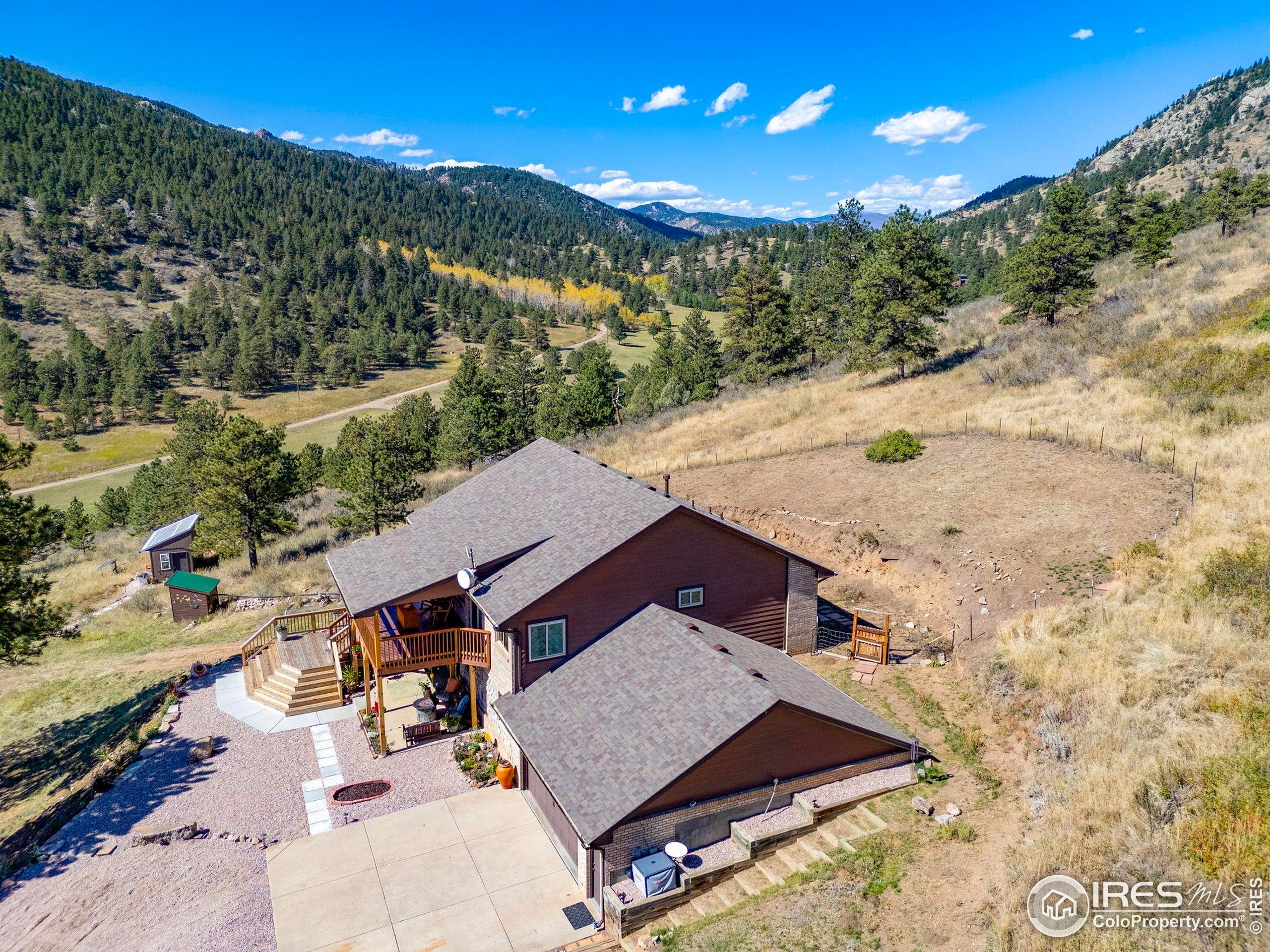 681 Bitterroot Gulch Road Loveland, CO 80537 - Photo 46 of 47 an aerial view of a house