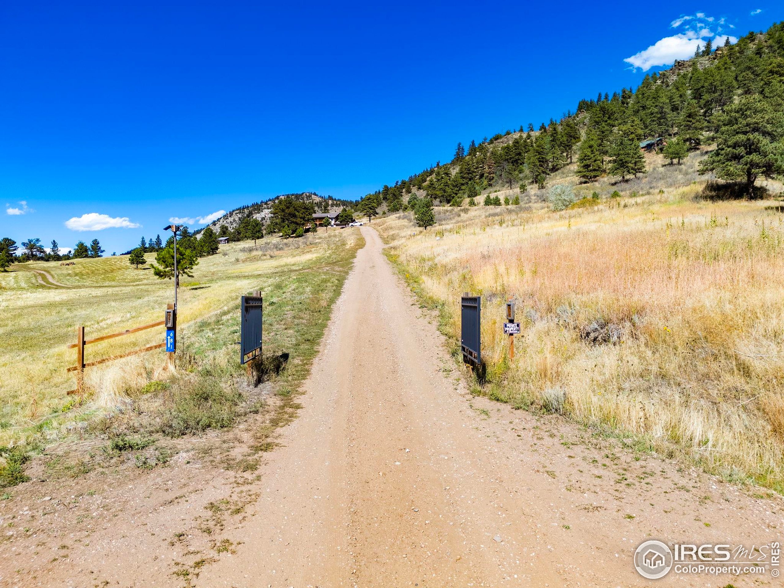 681 Bitterroot Gulch Road Loveland, CO 80537 - Photo 47 of 47 a view of a beach with ocean view