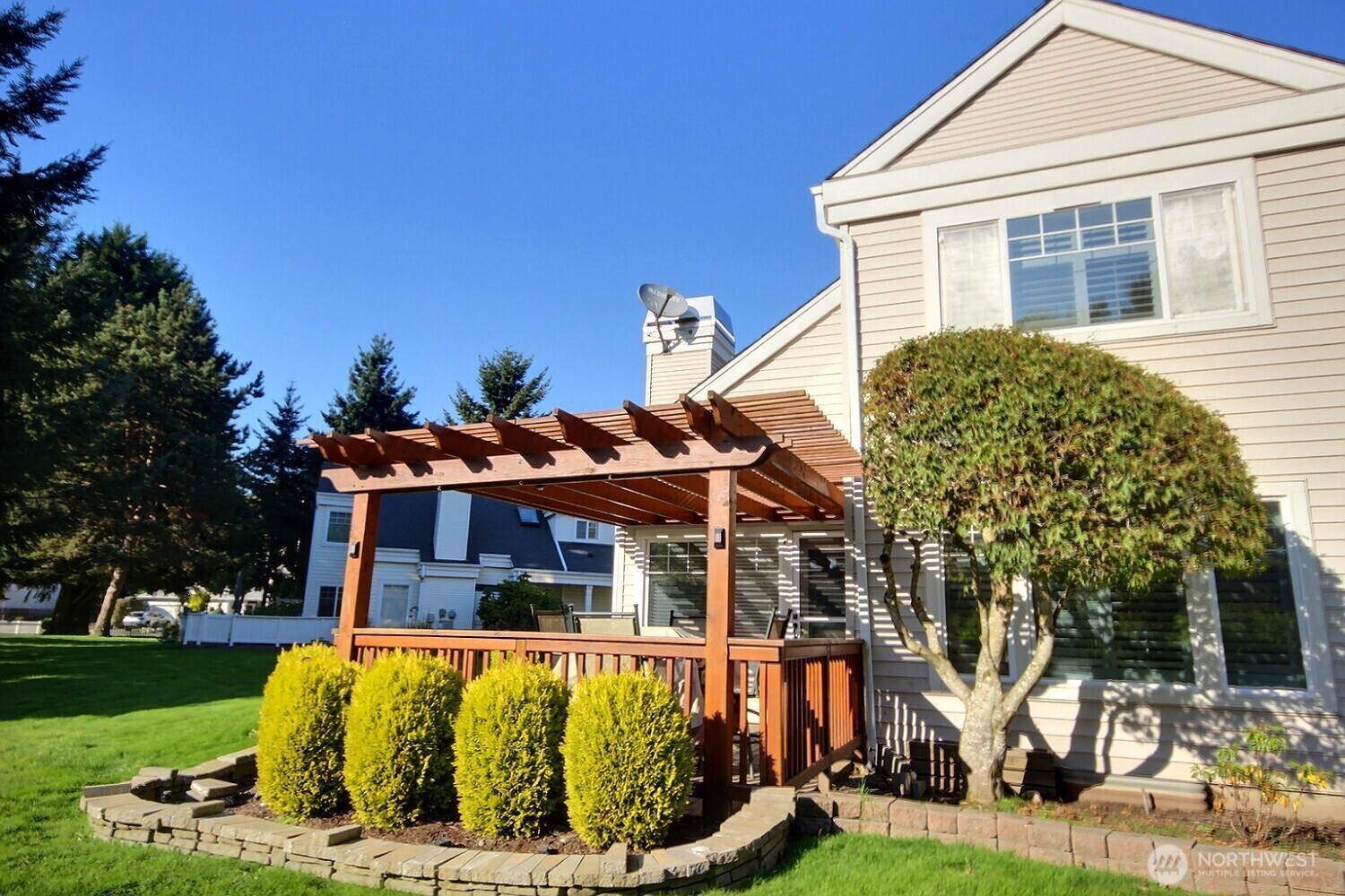 5409 South 237th Place, Unit 164 Kent, WA 98032 - Photo 20 of 25 front view of house with a yard