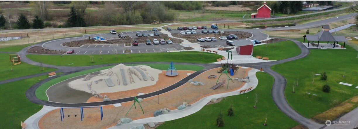5409 South 237th Place, Unit 164 Kent, WA 98032 - Photo 23 of 25 a view of a swimming pool with a porch and yard