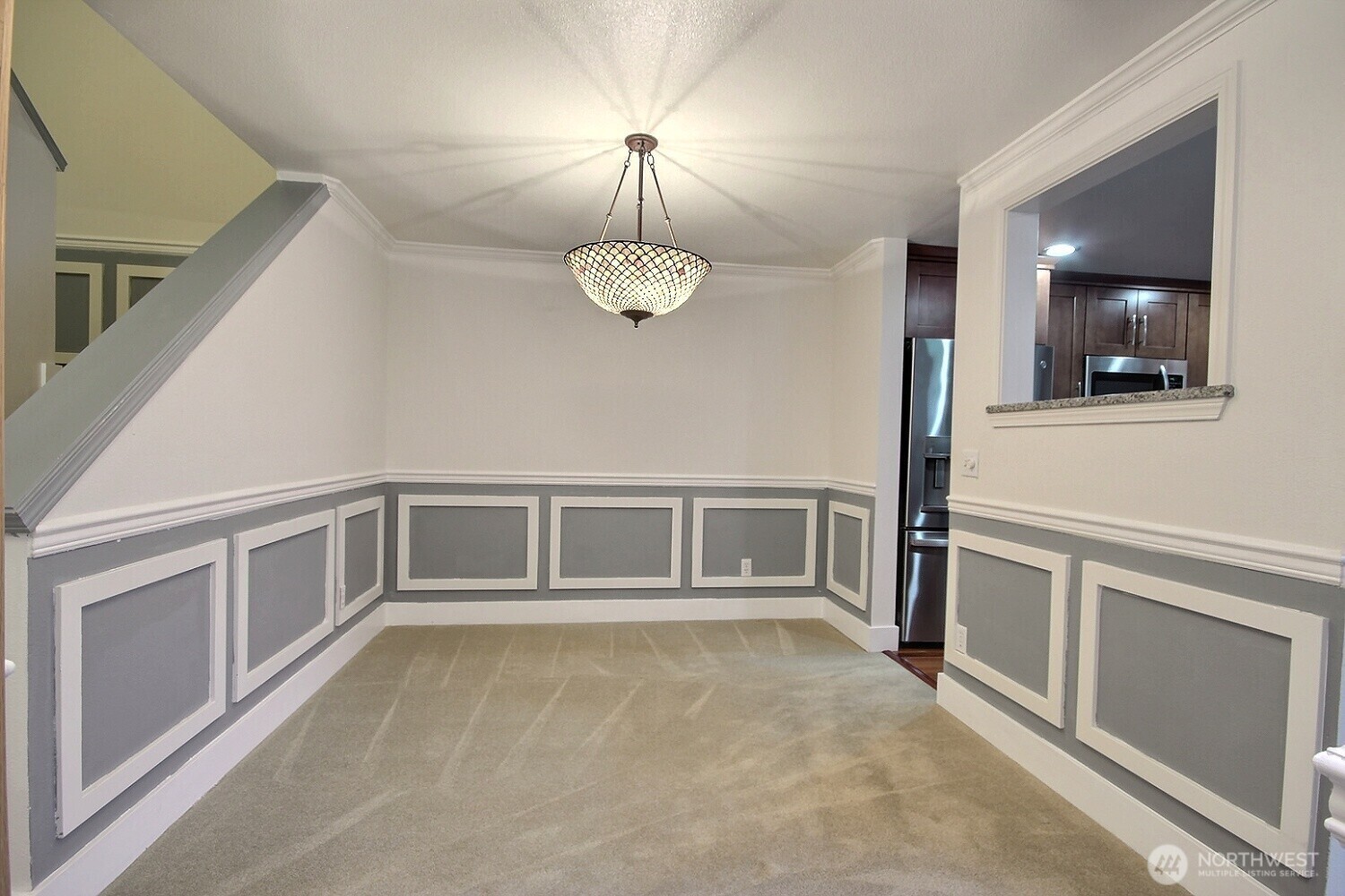 5409 South 237th Place, Unit 164 Kent, WA 98032 - Photo 4 of 25 a view of an empty room with a window