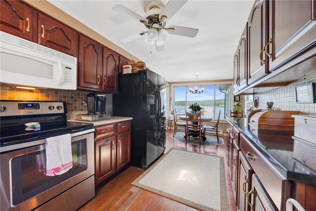 5317 West Lake Road Geneseo, NY 14454 - Photo 27 of 50 BEAUTIFUL CHERRY KITCHEN OPEN TO DINING AREA AND L