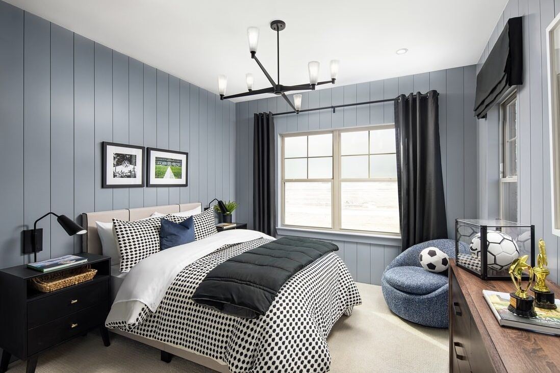 2615 Wilkinson Pike, Unit 15A Murfreesboro, TN 37129 - Photo 10 of 21 a bedroom with a bed and a chandelier