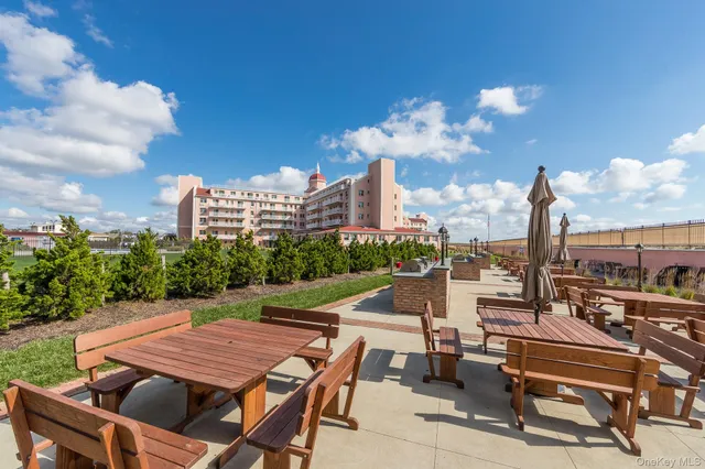 a view of a terrace with sitting area