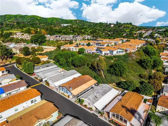 an aerial view of a house with a garden