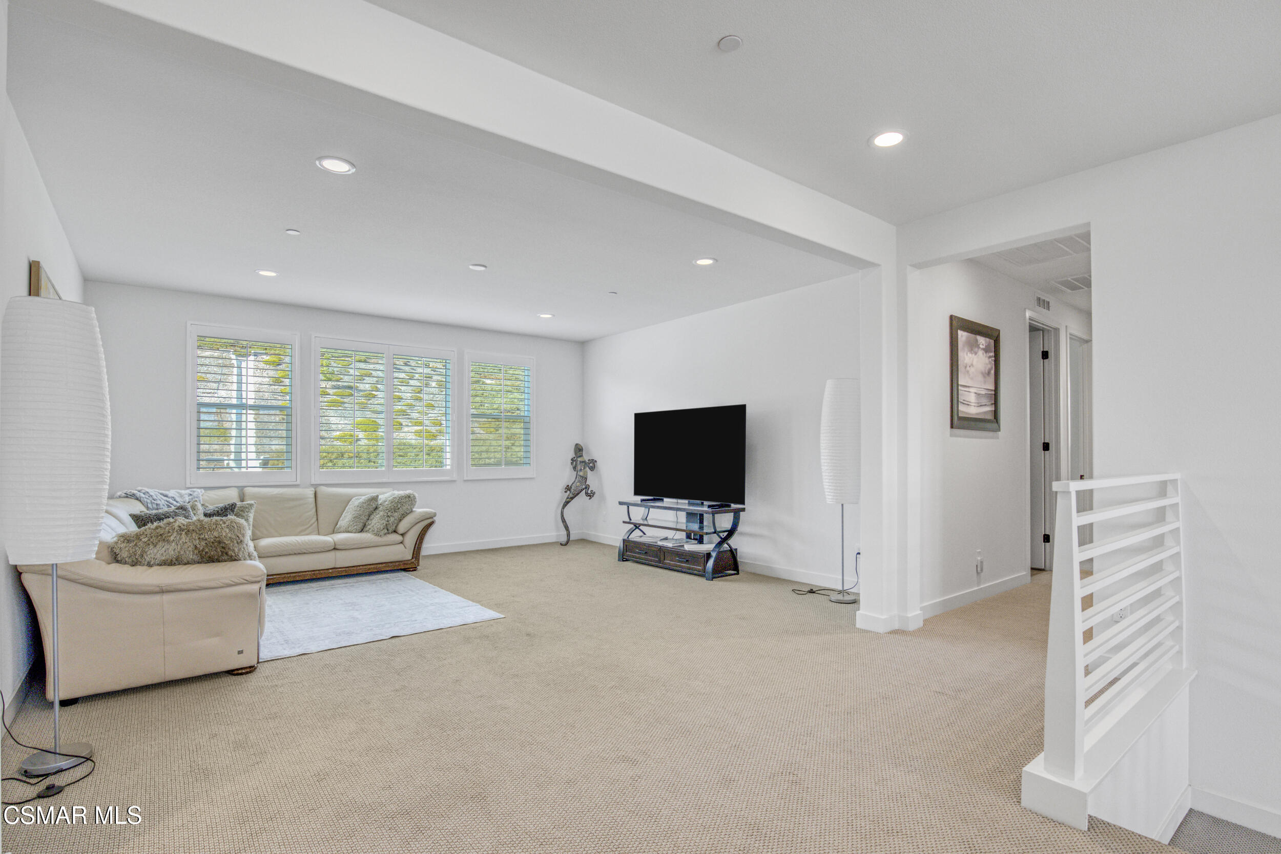 28665 Windbreak Trail Saugus, CA 91350 - Photo 19 of 56 a living room with furniture and a flat screen tv