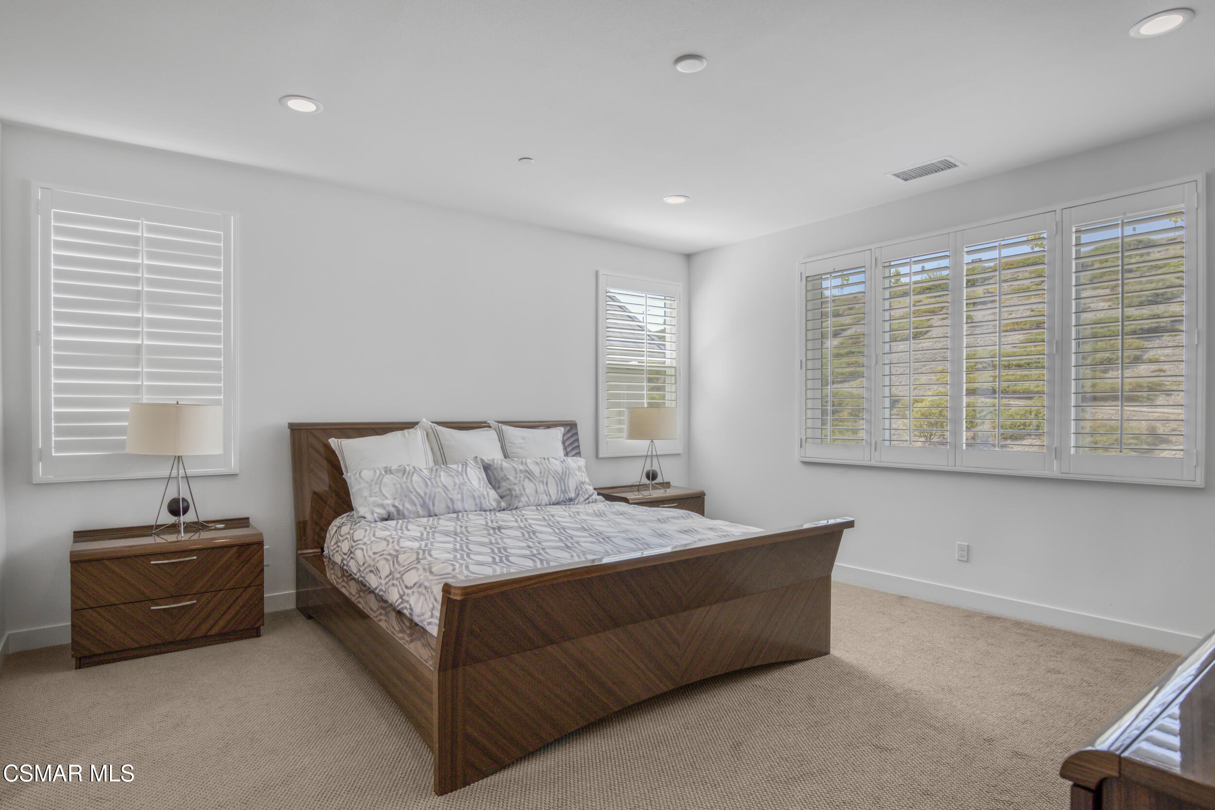 28665 Windbreak Trail Saugus, CA 91350 - Photo 21 of 56 a living room with a bed furniture and next to a window