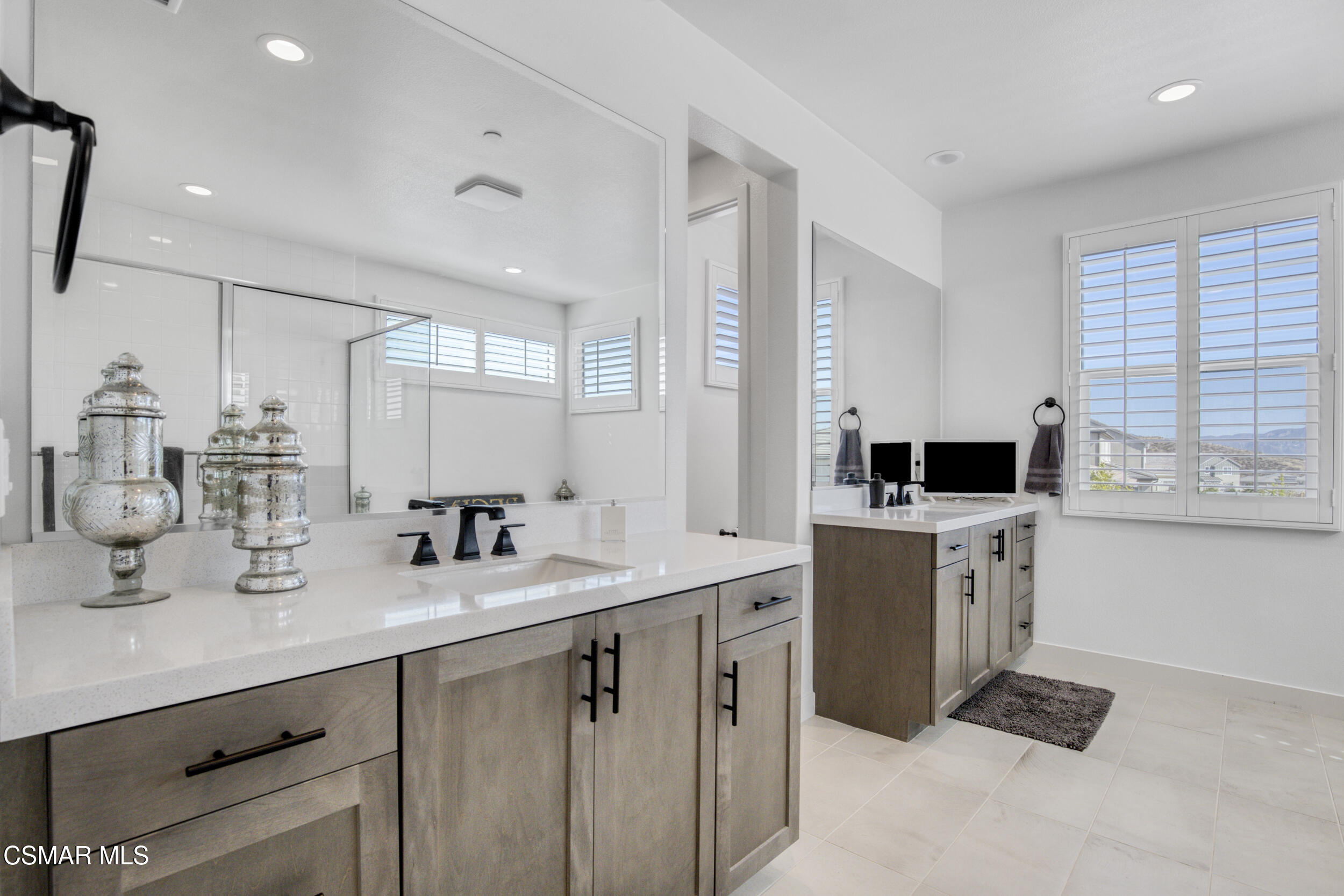 28665 Windbreak Trail Saugus, CA 91350 - Photo 23 of 56 a kitchen with a sink stove and refrigerator