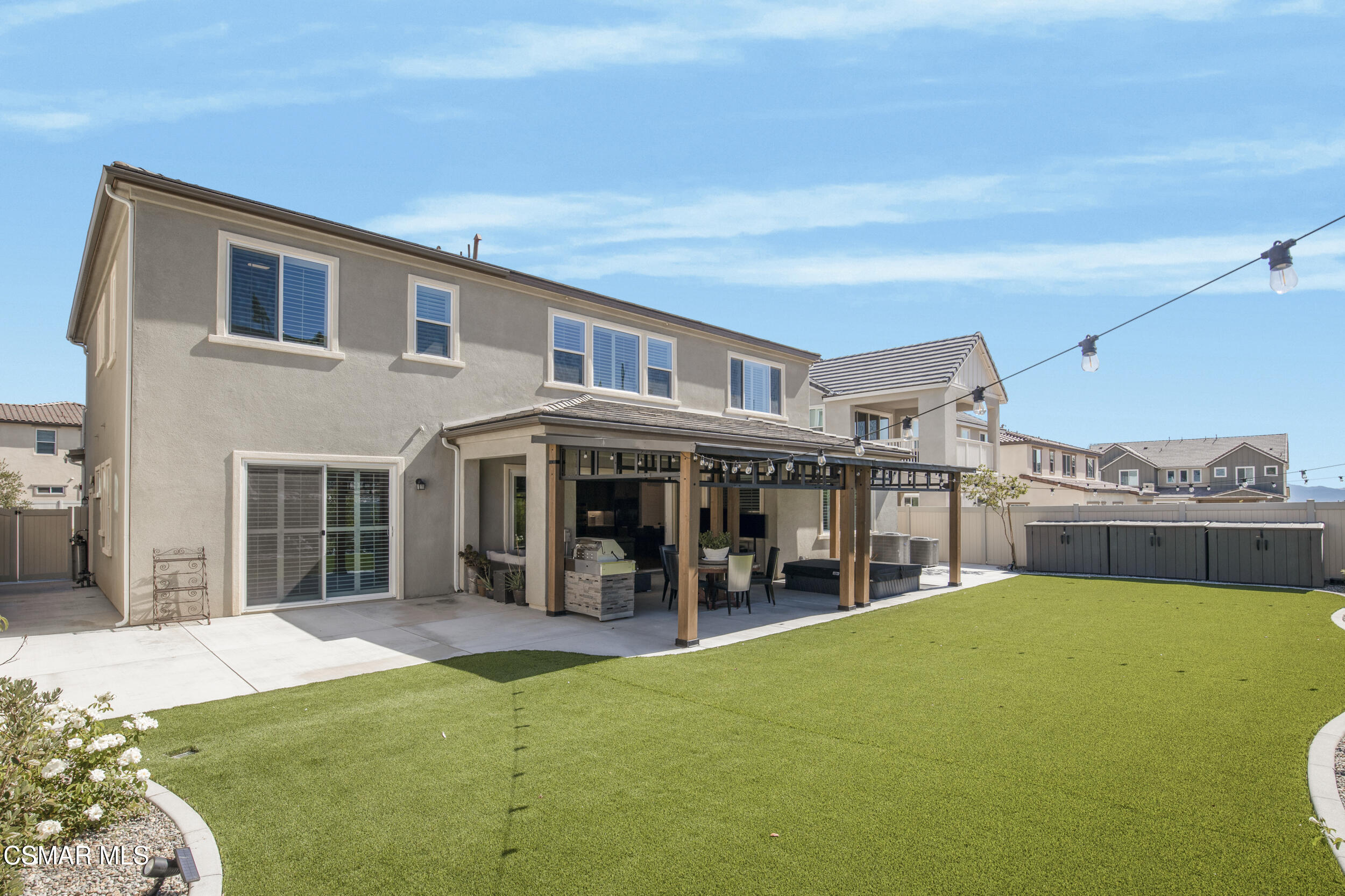 28665 Windbreak Trail Saugus, CA 91350 - Photo 32 of 56 a view of a house with a backyard porch and sitting area